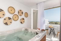 Romantic Honeymoon Suite with Jacuzzi and Sea View